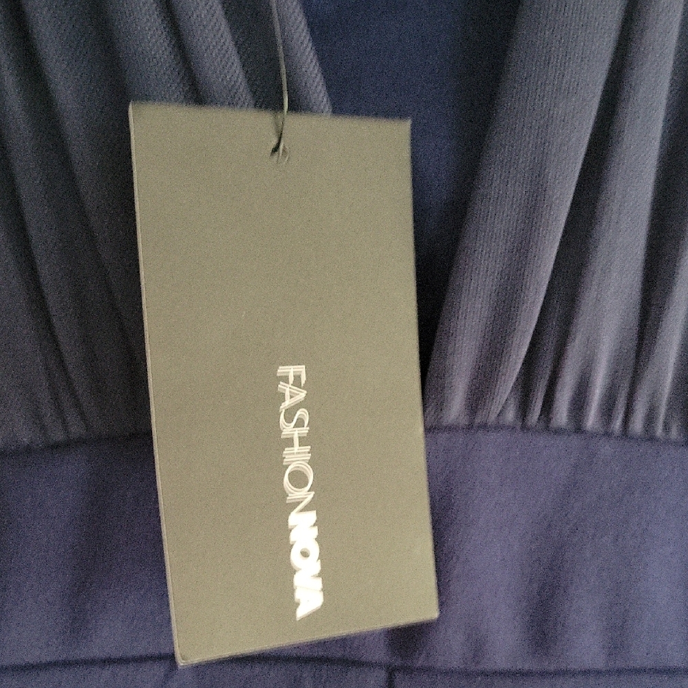 Sophisticated Blue Jumpsuit with Wide-Leg Pants and High Neckline - Picture 4 of 6
